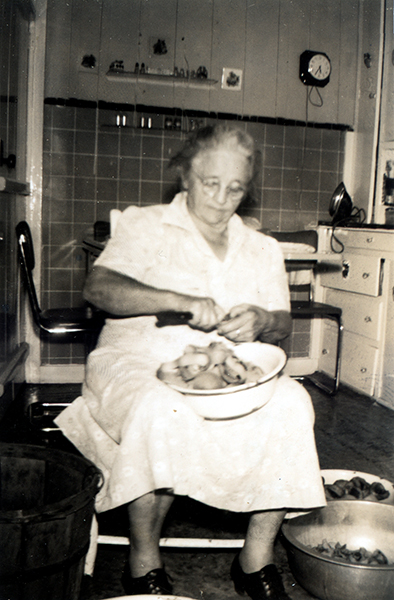 Emma Snodgrass Overton preparing food.